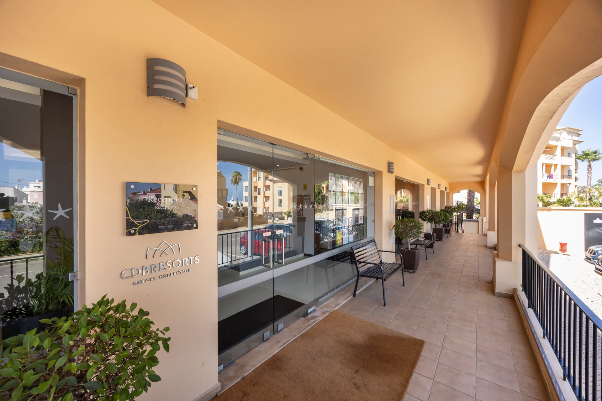 The arched walkway leading to the Estrela da Luz resort reception